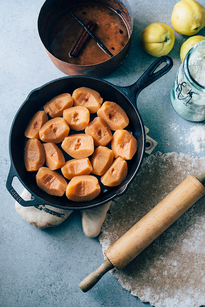 Vegan Quince Tarte Tatin with Rye Coconut Oil Crust | This rustic French dessert gets a vegan makeover with beautiful quinces flavored with maple, vanilla bean, and cinnamon stick and a rye & coconut oil crust. No butter needed!