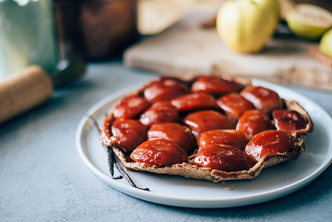 Vegan Quince Tarte Tatin with Rye Coconut Oil Crust | This rustic French dessert gets a vegan makeover with beautiful quinces flavored with maple, vanilla bean, and cinnamon stick and a rye & coconut oil crust. No butter needed!