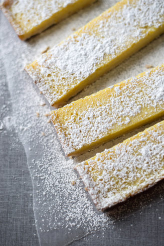 Meyer Lemon Bars (Vegan) | These vegan lemon bars are arguably better than "eggy" traditional lemon bars, plus they are lower in fat. Omnivores and vegans alike will absolutely love these at a potluck or bake sale.