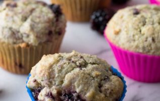 Corn & Blackberry Muffins via Sift & Whisk