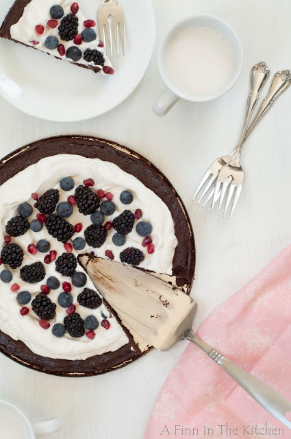 flourless chocolate honey cake with berries and a cloud of whipping cream 0926